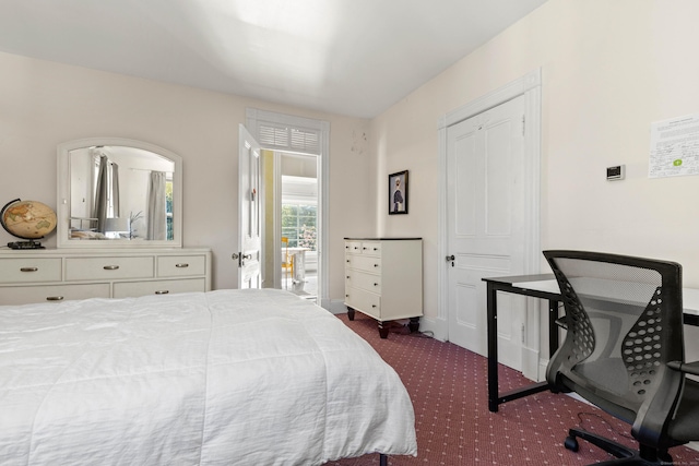178 Shore Ave, Groton, CT 06340 - bedroom with dark colored carpet and an office area