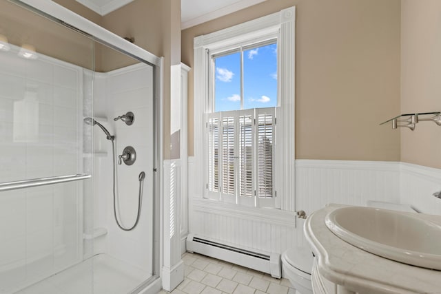 178 Shore Ave, Groton, CT 06340 - full bath featuring a baseboard heating unit, a shower stall, wainscoting, vanity, and tile patterned flooring