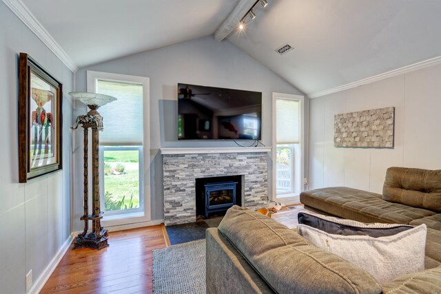 5 Quarry Rd, Stonington, CT 06355 - living area with wood finished floors, healthy amount of natural light, a fireplace, and crown molding