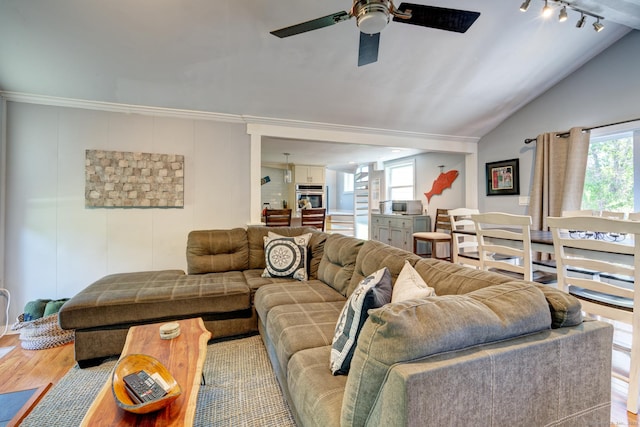 5 Quarry Rd, Stonington, CT 06355 - living room with wood finished floors, plenty of natural light, a ceiling fan, lofted ceiling, and crown molding