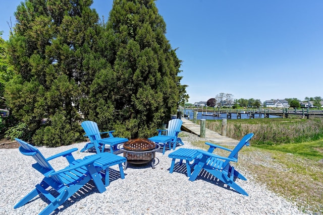 5 Quarry Rd, Stonington, CT 06355 - view of patio / terrace featuring an outdoor fire pit
