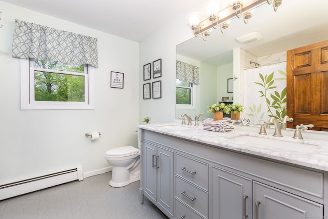 bathroom featuring baseboard heating, toilet, baseboards, double vanity, and curtained shower
