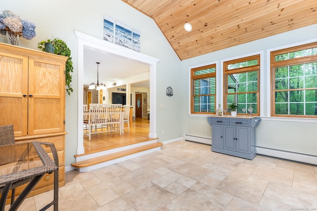 doorway with wooden ceiling, baseboard heating, a chandelier, high vaulted ceiling, and baseboards