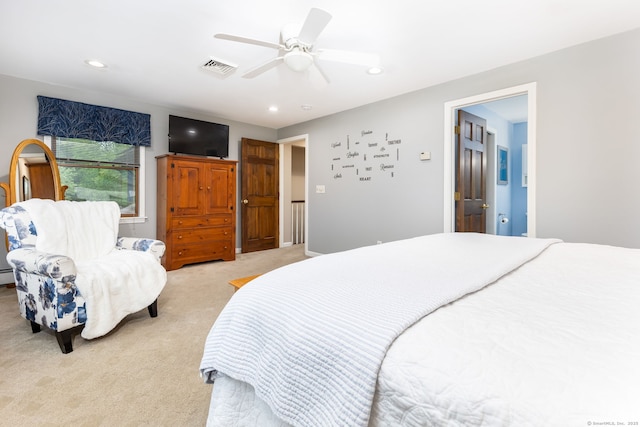 bedroom featuring light colored carpet, a ceiling fan, and recessed lighting