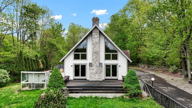233 N Society Rd, Canterbury, CT 06331 - back of house with a chimney and a wooden deck