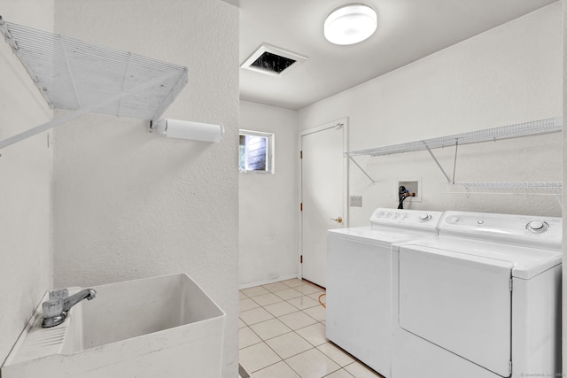 233 N Society Rd, Canterbury, CT 06331 - clothes washing area featuring washing machine and dryer and light tile patterned floors