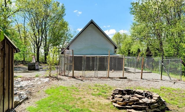 233 N Society Rd, Canterbury, CT 06331 - view of outbuilding featuring a fire pit and fence