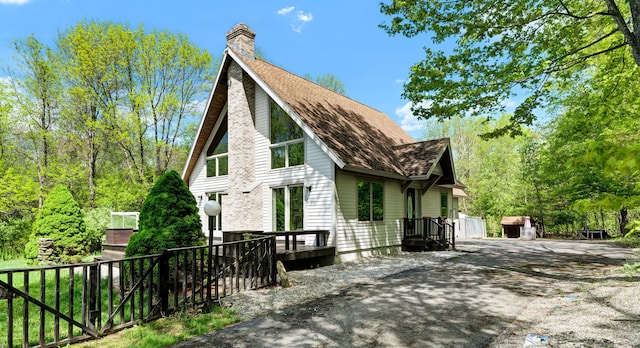 233 N Society Rd, Canterbury, CT 06331 - view of property exterior with a chimney