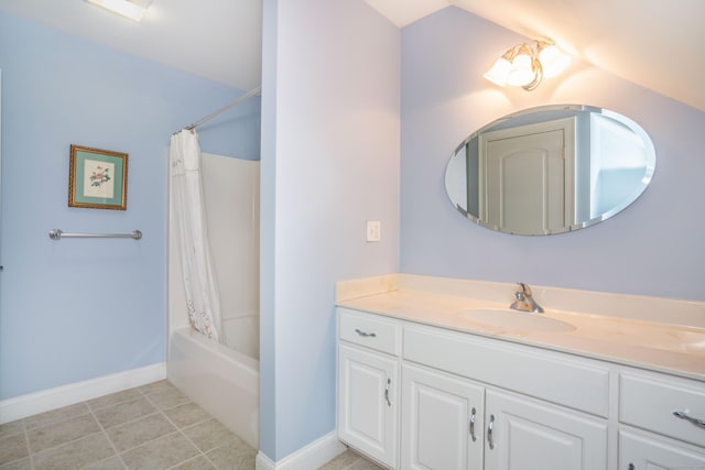 bathroom featuring vanity, baseboards, and shower / bath combination with curtain