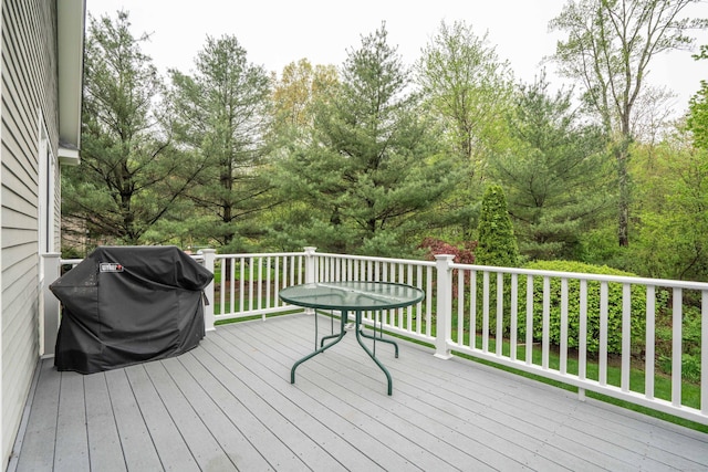 wooden deck featuring grilling area