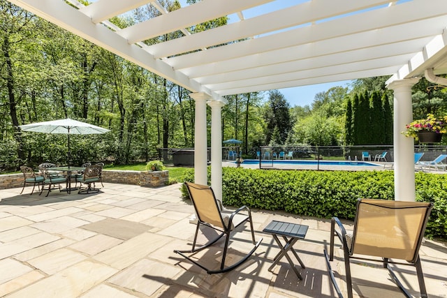 16 Cider Mill Rd, Burlington, CT 06013 - view of patio featuring a covered hot tub, a pergola, outdoor dining space, and view of wooded area
