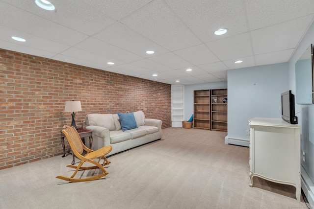 16 Cider Mill Rd, Burlington, CT 06013 - carpeted living area featuring brick wall, a drop ceiling, recessed lighting, built in shelves, and baseboard heating
