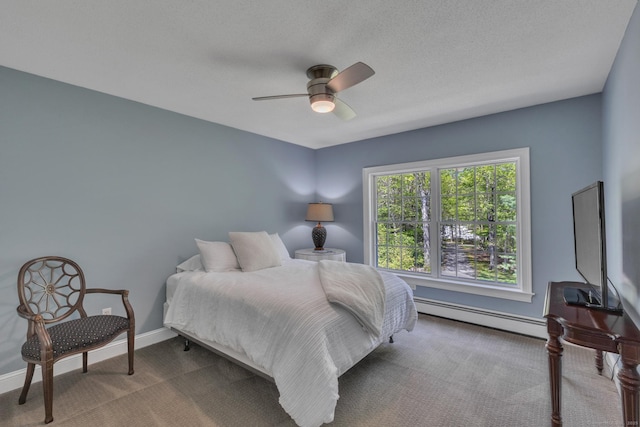 16 Cider Mill Rd, Burlington, CT 06013 - carpeted bedroom with a baseboard radiator and ceiling fan