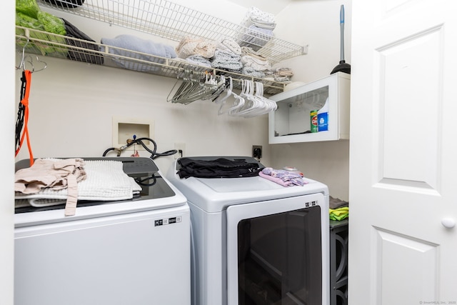 laundry room featuring independent washer and dryer