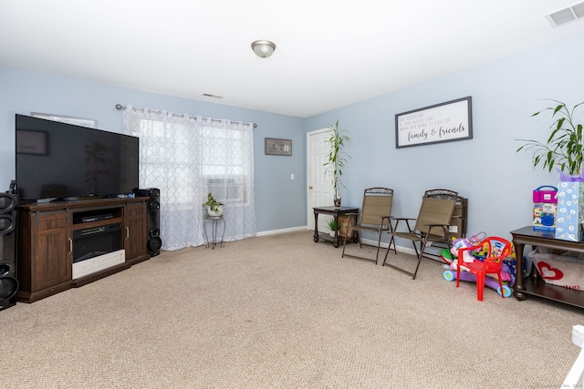 game room with carpet flooring and baseboards