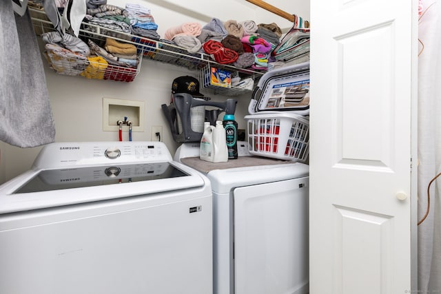 laundry area featuring separate washer and dryer