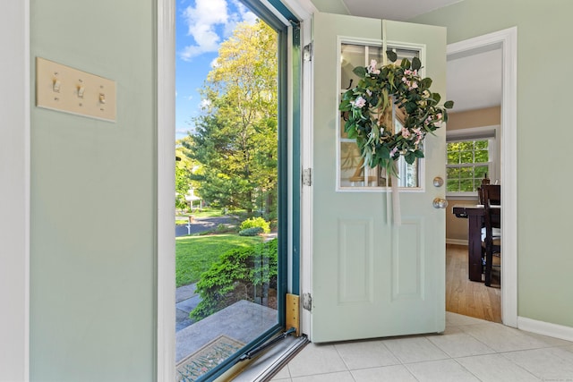 5 Willow Ln, East Lyme, CT 06333 - foyer with light tile patterned floors and baseboards