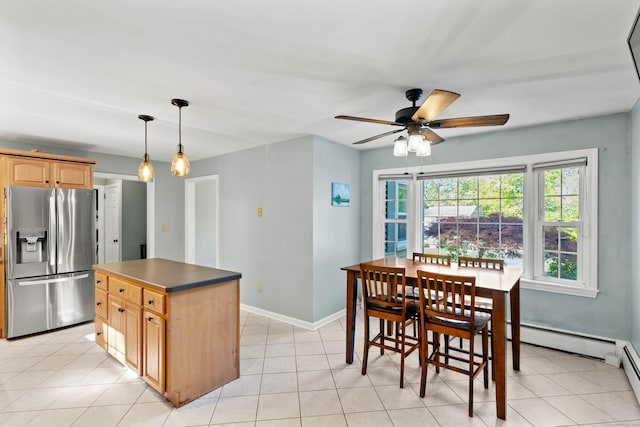 5 Willow Ln, East Lyme, CT 06333 - kitchen with stainless steel refrigerator with ice dispenser, ceiling fan, light brown cabinetry, baseboards, and a kitchen island