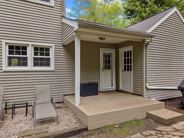 5 Willow Ln, East Lyme, CT 06333 - property entrance featuring roof with shingles