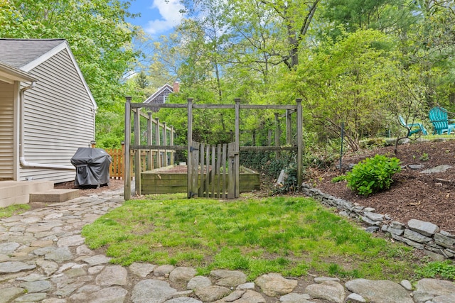 5 Willow Ln, East Lyme, CT 06333 - view of yard with fence and a vegetable garden