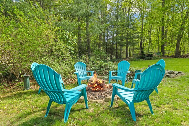 5 Willow Ln, East Lyme, CT 06333 - view of green lawn with a fire pit