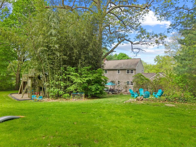5 Willow Ln, East Lyme, CT 06333 - view of grassy yard featuring a playground