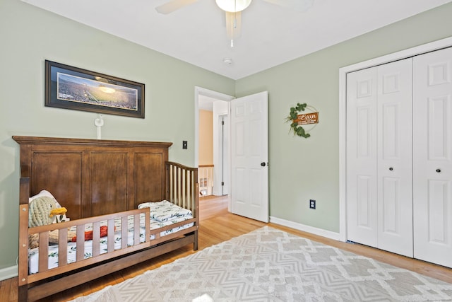5 Willow Ln, East Lyme, CT 06333 - bedroom with light wood-style flooring, a closet, a ceiling fan, and baseboards