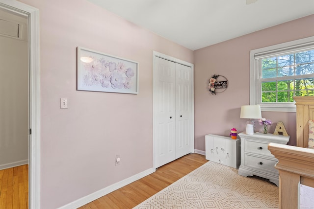5 Willow Ln, East Lyme, CT 06333 - bedroom featuring light wood-type flooring, baseboards, and a closet