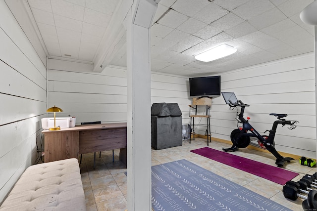 5 Willow Ln, East Lyme, CT 06333 - workout room featuring tile patterned flooring and wooden walls
