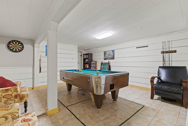 5 Willow Ln, East Lyme, CT 06333 - game room with pool table, wooden walls, and light tile patterned floors