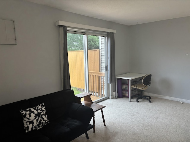 carpeted office with baseboards