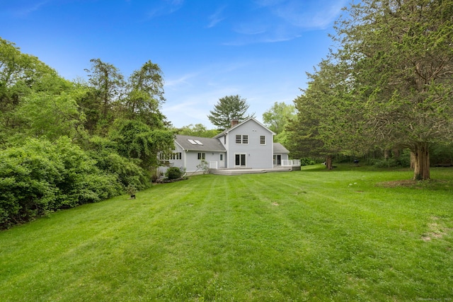 98 Hemlock Valley Rd, East Haddam, CT 06423 - view of green lawn featuring a deck