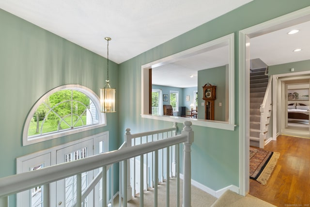 98 Hemlock Valley Rd, East Haddam, CT 06423 - hallway featuring plenty of natural light, baseboards, an upstairs landing, and recessed lighting