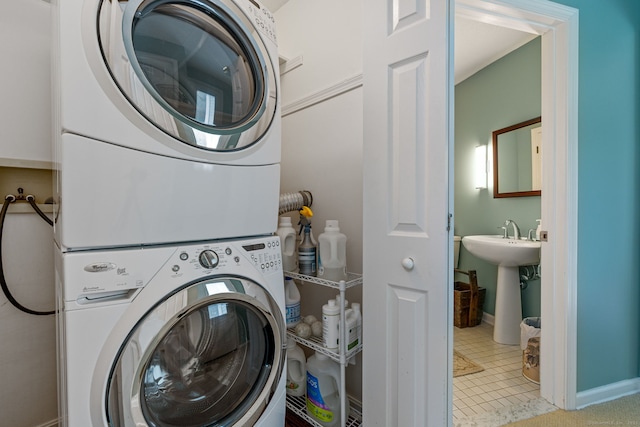 98 Hemlock Valley Rd, East Haddam, CT 06423 - washroom featuring stacked washer and clothes dryer, baseboards, and tile patterned flooring