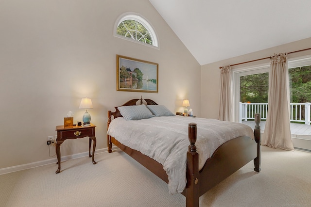 98 Hemlock Valley Rd, East Haddam, CT 06423 - bedroom featuring light carpet, access to outside, high vaulted ceiling, multiple windows, and baseboards