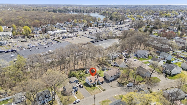 aerial view of property's location with nearby suburban area