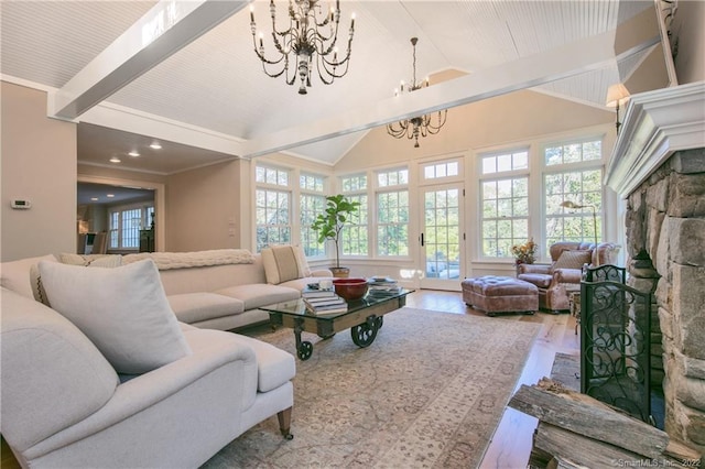 521 State St, Guilford, CT 06437 - living area with a chandelier, beamed ceiling, wood finished floors, healthy amount of natural light, and high vaulted ceiling