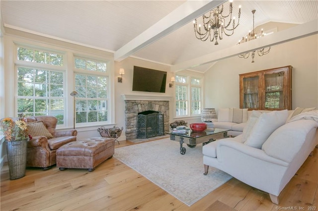 521 State St, Guilford, CT 06437 - living area with wood finished floors, a fireplace, and a chandelier