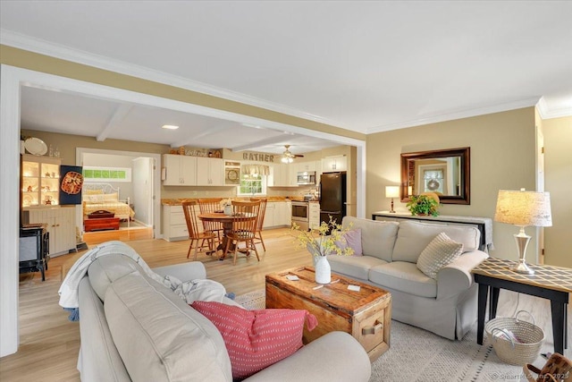 20 Thayer Road Ext, Haddam, CT 06441 - living area featuring light wood-style floors, beamed ceiling, ceiling fan, and ornamental molding