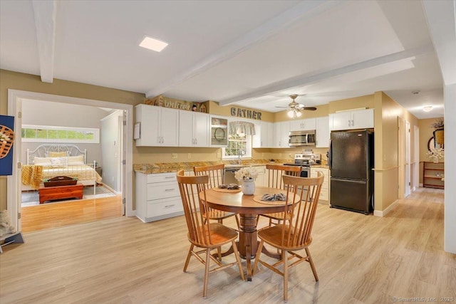 20 Thayer Road Ext, Haddam, CT 06441 - dining room featuring beam ceiling, plenty of natural light, light wood-type flooring, ceiling fan, and baseboards