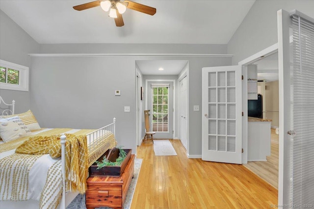 20 Thayer Road Ext, Haddam, CT 06441 - bedroom with black refrigerator, light wood-style flooring, a ceiling fan, vaulted ceiling, and baseboards