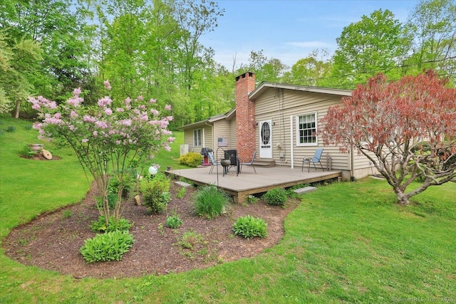 20 Thayer Road Ext, Haddam, CT 06441 - rear view of property featuring a wooden deck, a chimney, and a yard