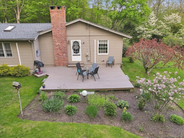 20 Thayer Road Ext, Haddam, CT 06441 - back of property with a chimney, a deck, and a yard