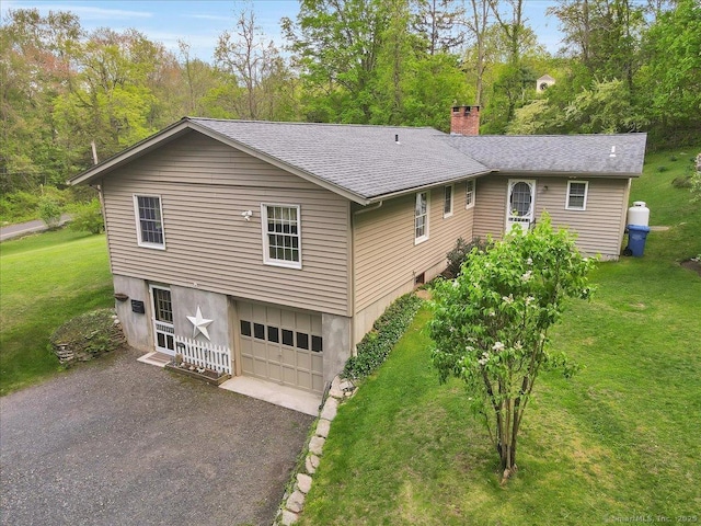 20 Thayer Road Ext, Haddam, CT 06441 - ranch-style home featuring a chimney, asphalt driveway, a front yard, an attached garage, and a shingled roof