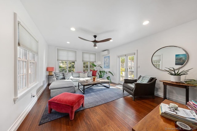 1050 King St, Greenwich, CT 06831 - living area featuring a ceiling fan, wood finished floors, baseboards, recessed lighting, and an AC wall unit