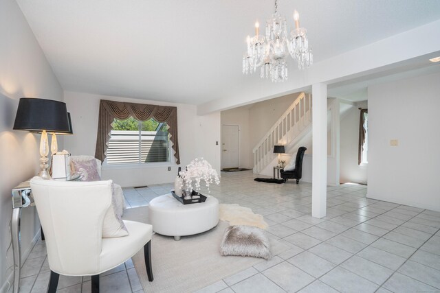 592 Mountain Rd Unit A, West Hartford, CT 06117 - living area featuring stairway, a chandelier, and light tile patterned floors