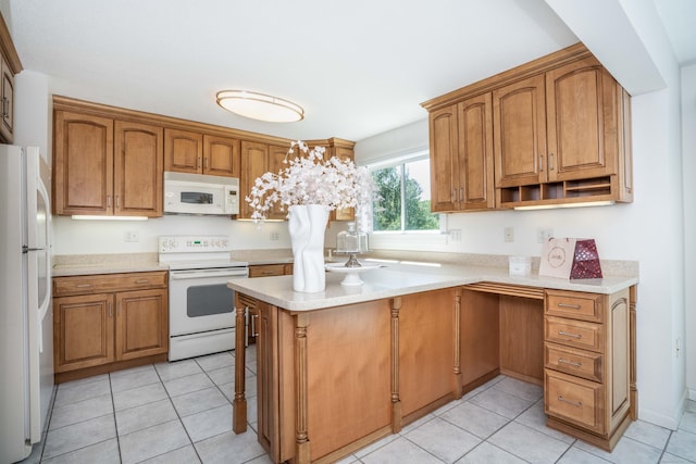 592 Mountain Rd Unit A, West Hartford, CT 06117 - kitchen featuring white appliances, light countertops, light tile patterned floors, and brown cabinets