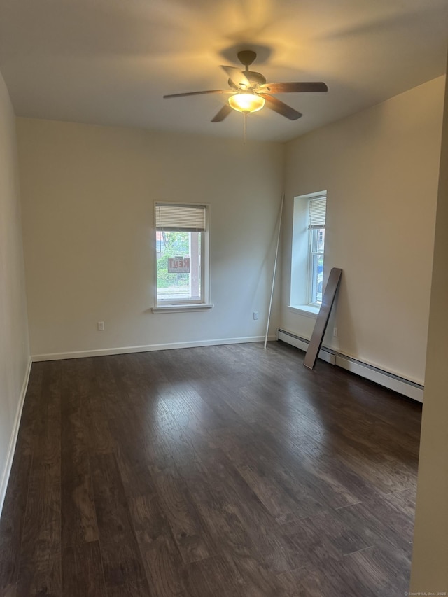 15 Townley St, Hartford, CT 06105 - spare room with a baseboard heating unit, dark wood-type flooring, ceiling fan, and baseboards