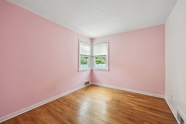 26 Brian Rd, West Hartford, CT 06110 - empty room with hardwood / wood-style flooring and baseboards