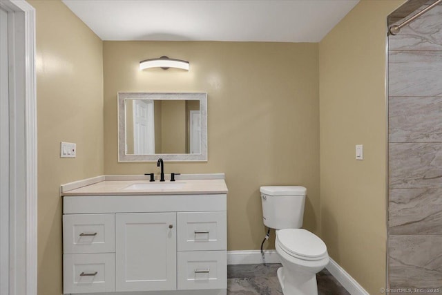 1813 Peck Ln, Cheshire, CT 06410 - bathroom featuring toilet, baseboards, and vanity